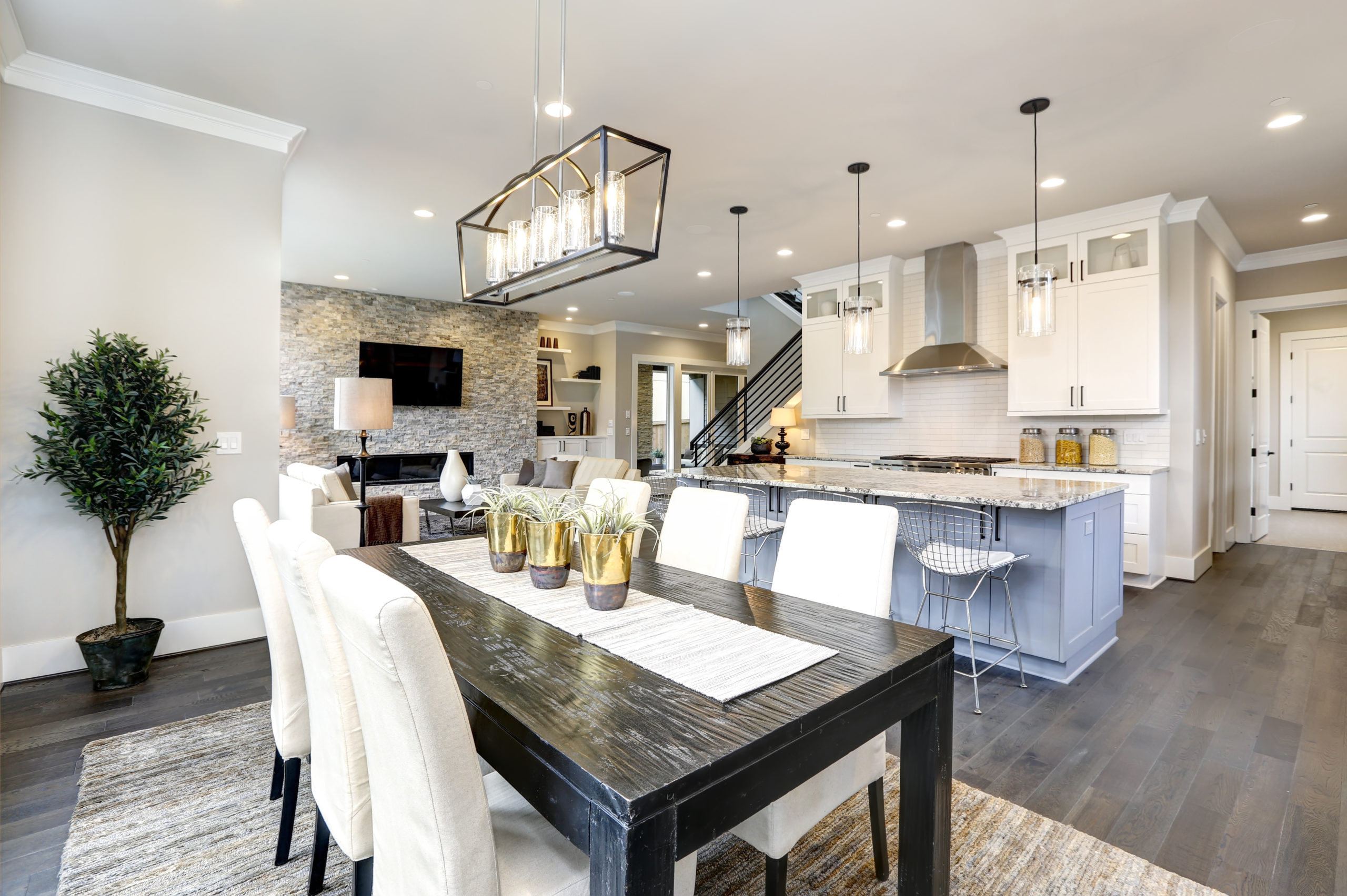Beautiful kitchen in luxury modern contemporary home interior with island and chairs springfield il